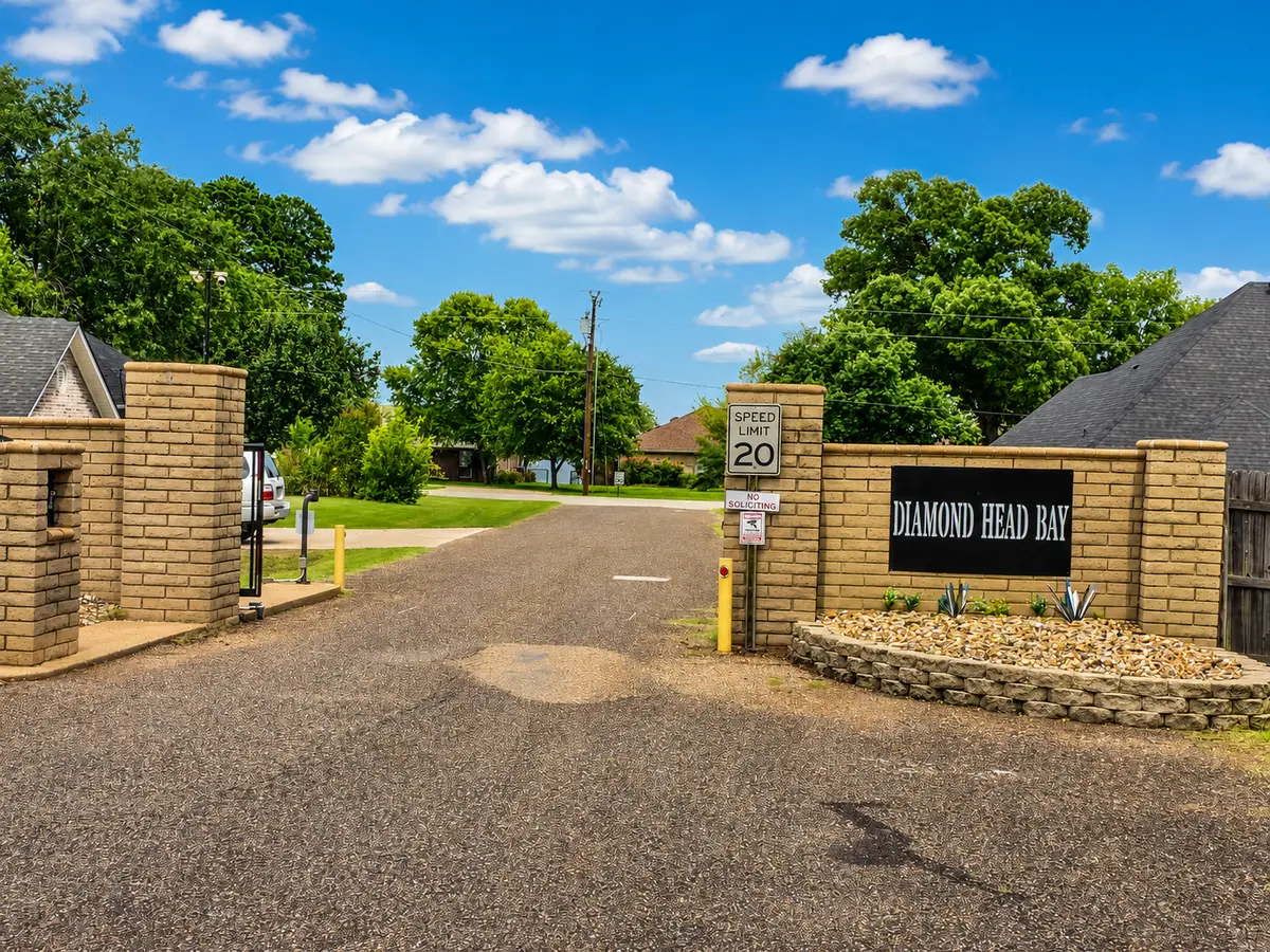 Gated entrance to Diamond Head Bay community on Lake Palestine near Frankston Texas
