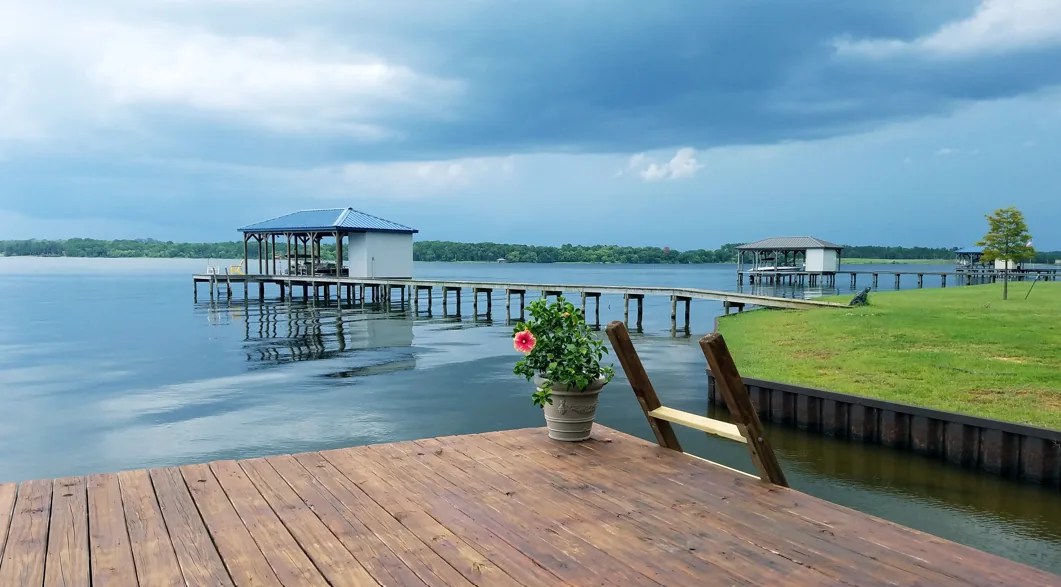 Waterfront dock and boathouse on Lake Palestine East Texas